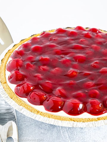 This Cherry Cheesecake pie is incredibly easy to make and tastes delicious! It includes a delicious cream cheese filling with cherry filling on top!