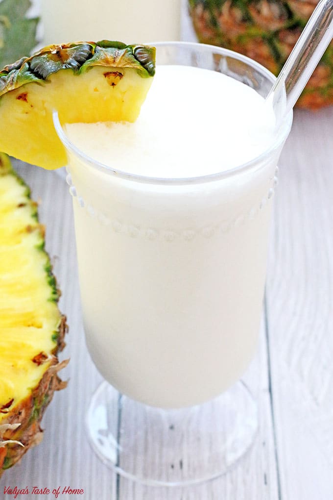 Pina Colada Smoothie is one of the most popular tropical drinks for a very good reason: the perfect creamy mix blended out of pineapple juice. There are many types of Pina Colada recipes, but I make mine simple. If you like the coconut flavor in yours, you may add coconut cream or milk instead of half & half. Just throw all the ingredients into the blender and the rest is done for you. It melts quickly so make sure to serve it right away. | www.valyastasteofhome.com