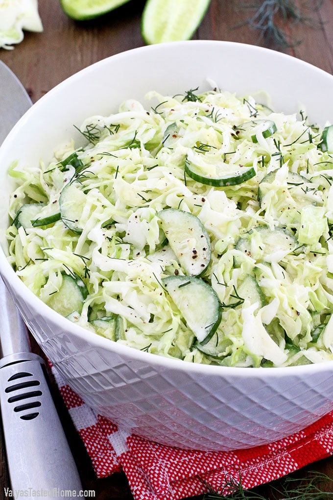 This Creamy Cabbage and Cucumber Salad is very easy to make and sure is healthy. It's crispy, creamy, refreshing and savory. The crunchy texture and scrumptious flavor pairs nicely with practically any softer and milder dish, such as mashed potatoes or pasta. #familyfavorite #freshveggiesalad #easyrecipe #valyastasteofhome