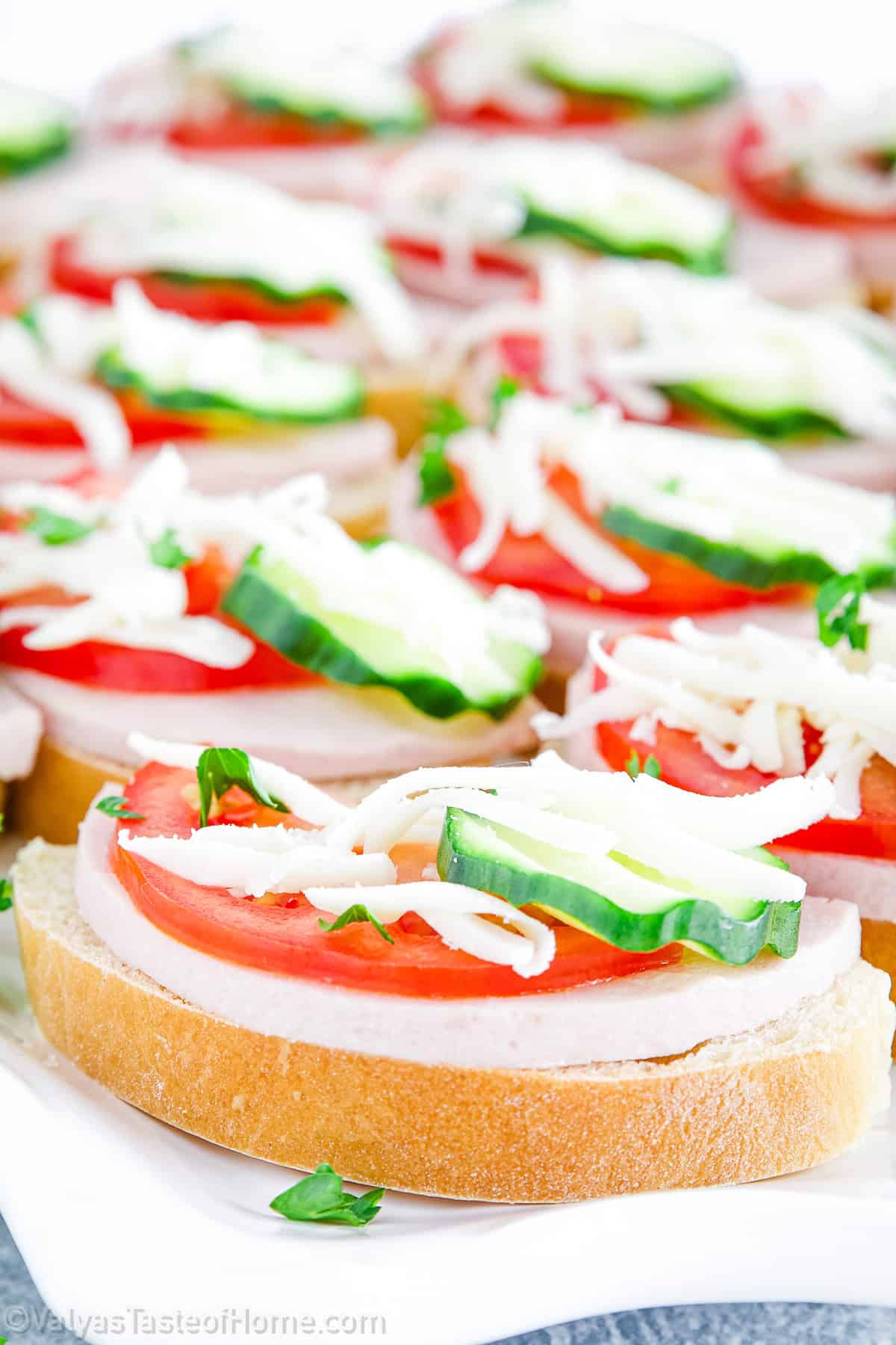 These mini open-face sandwiches are not only adorable and delicious, but they're also a hit with the little ones.