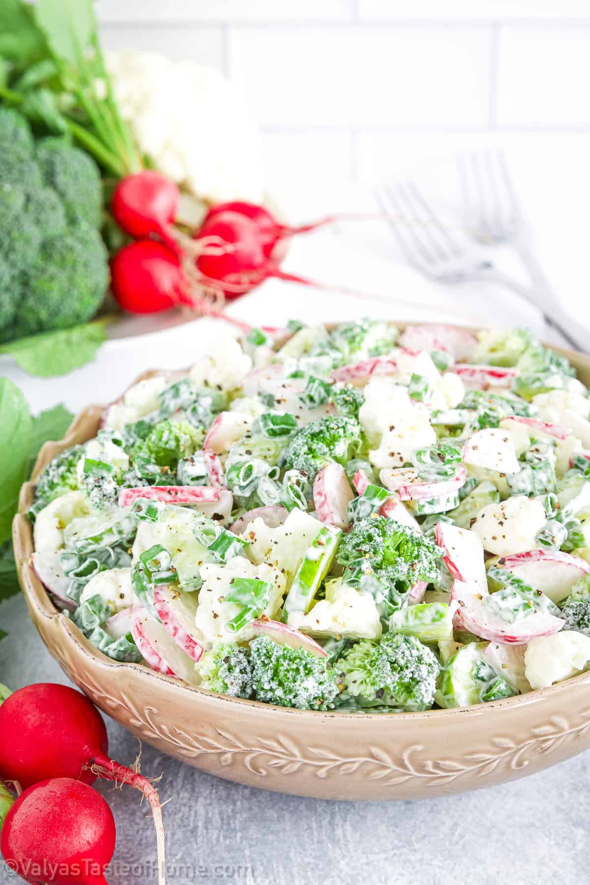 The combination of fresh vegetables with creamy mayo and sour cream dressing is a classic that never fails to satisfy.