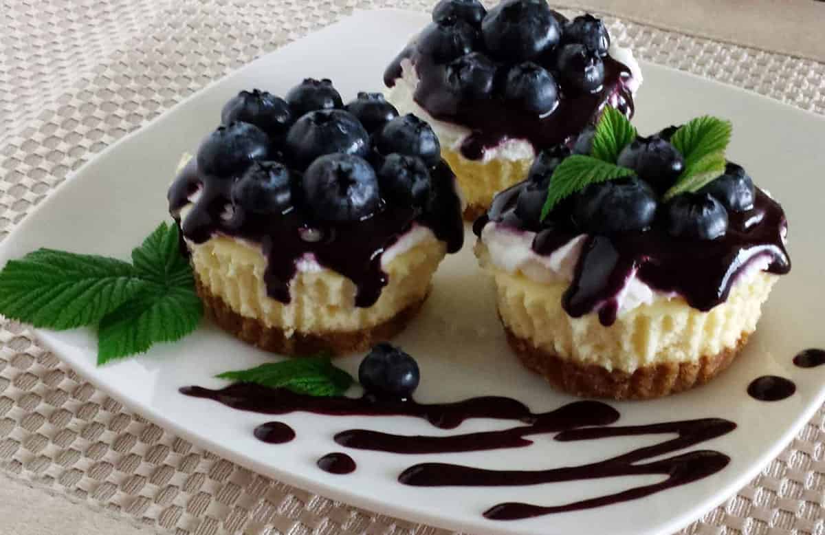 Blueberry cheesecake is a favorite treat among those who prefer the acidic creaminess of the cheesecake combined with the natural sweetness of blueberries.