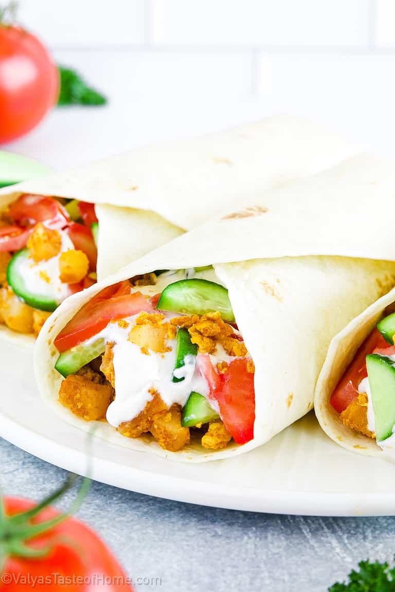Breakfast tacos are a popular Mexican-American breakfast dish that typically includes scrambled eggs, chorizo, potatoes, and a variety of toppings such as salsa, cucumbers, tomatoes, avocado, sour cream, and bacon or sausage.