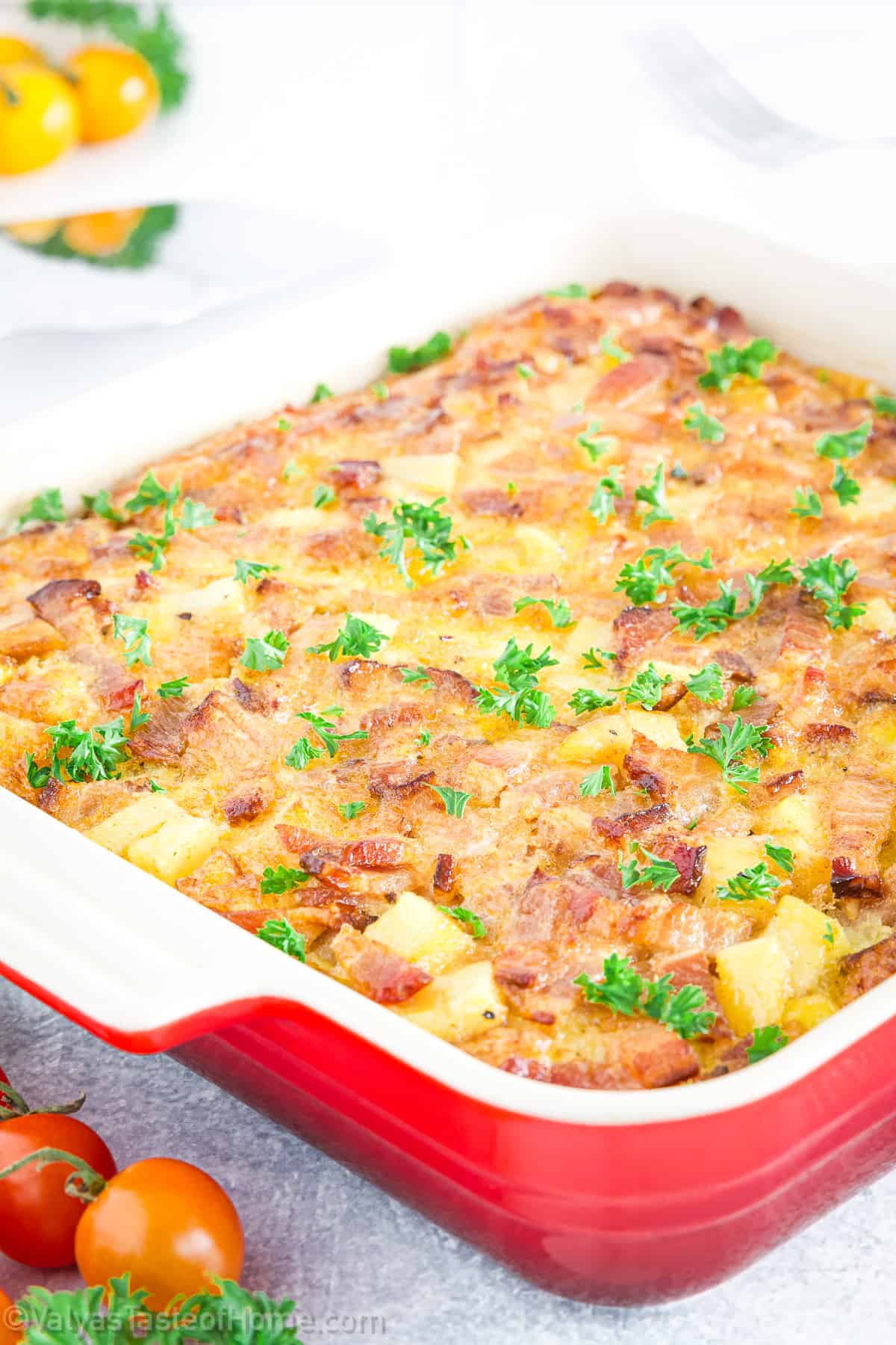 The bacon gets fried up crispy, the potatoes get sautéed just right, and the egg mixture gets poured over everything before the whole dish bakes up. 