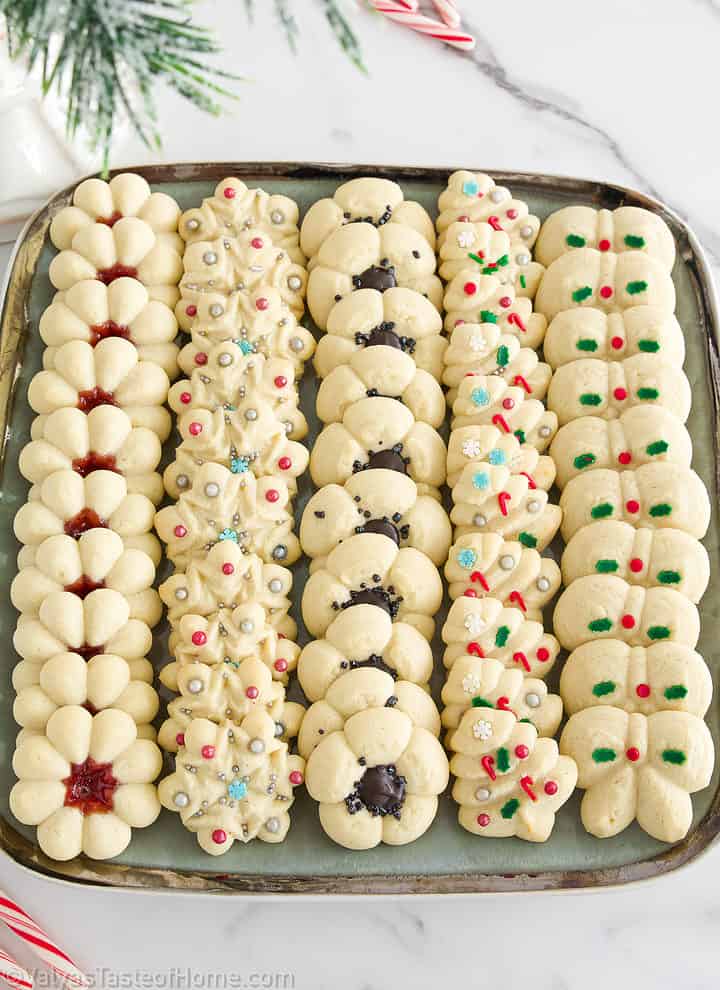 This Christmas Cookies recipe (Spritz Cookies) will give you classic and delicious flavors easily at home! With festive shapes and decor these are bound to win everyone's heart!