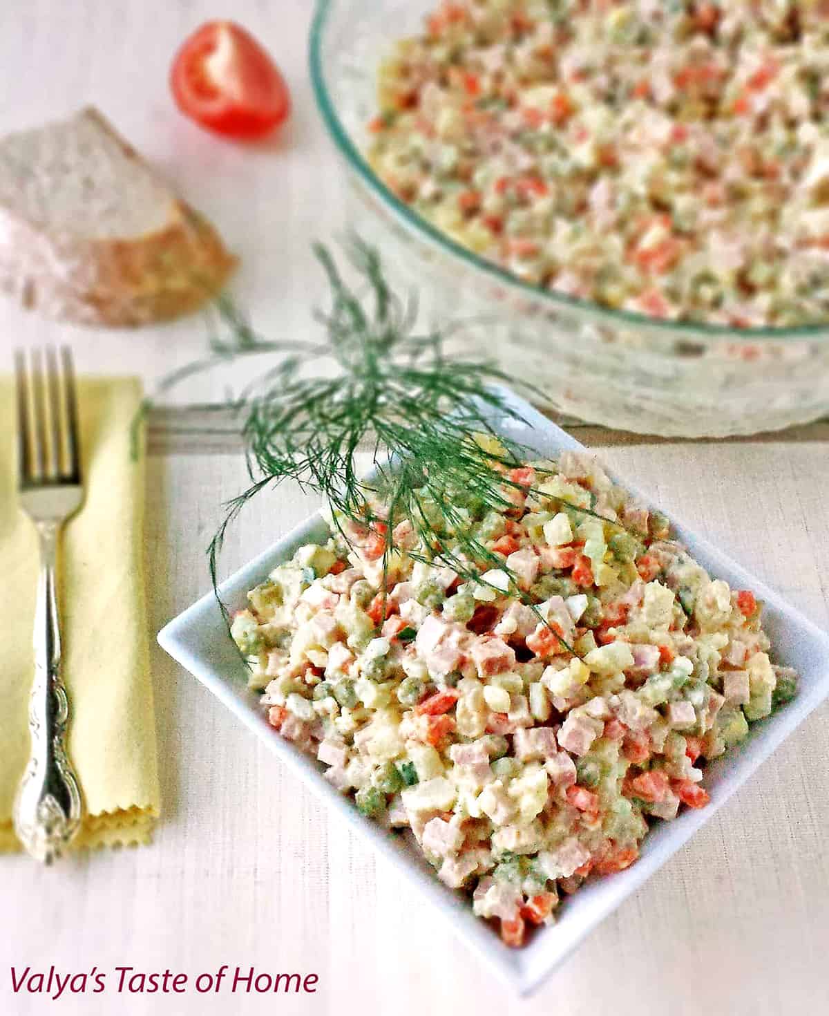 This Classic Potato Salad Recipe (Olivie) is a must-have on any holiday table. It's very easy to make, very hearty, and craveable. Just cook some veggies and eggs, chop them up, add mayo, salt, and pepper and you have a very delicious salad. 