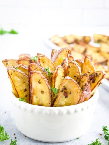 This roasted potato wedge recipe is a game-changer in its simplicity. With just three ingredients, you'll achieve a side dish that's quick and easy.