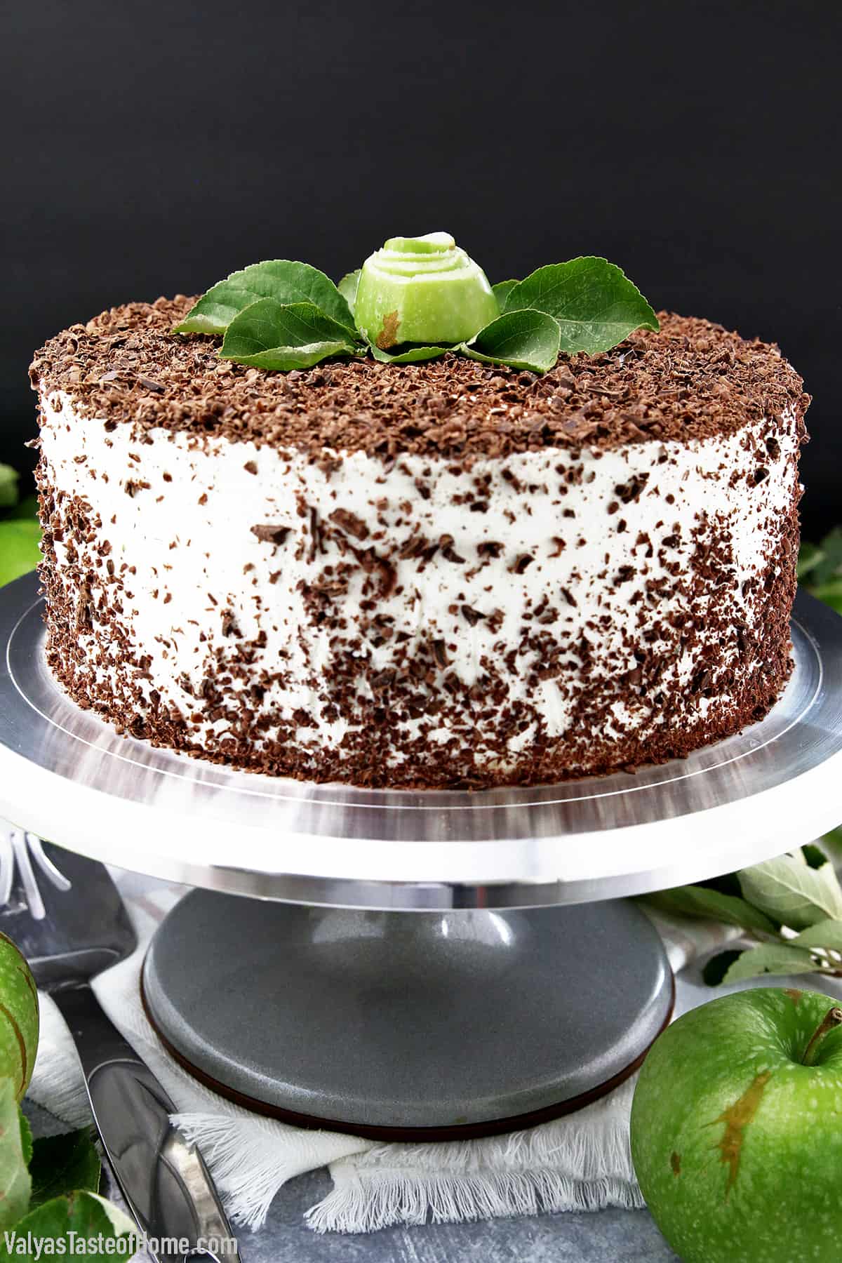 This Simple Apple Cake with Cream Cheese Frosting is light, moist, loaded with freshly chopped apples, topped with lots of dark chocolate shavings, and comes together quickly for a fantastic family-favorite dessert.