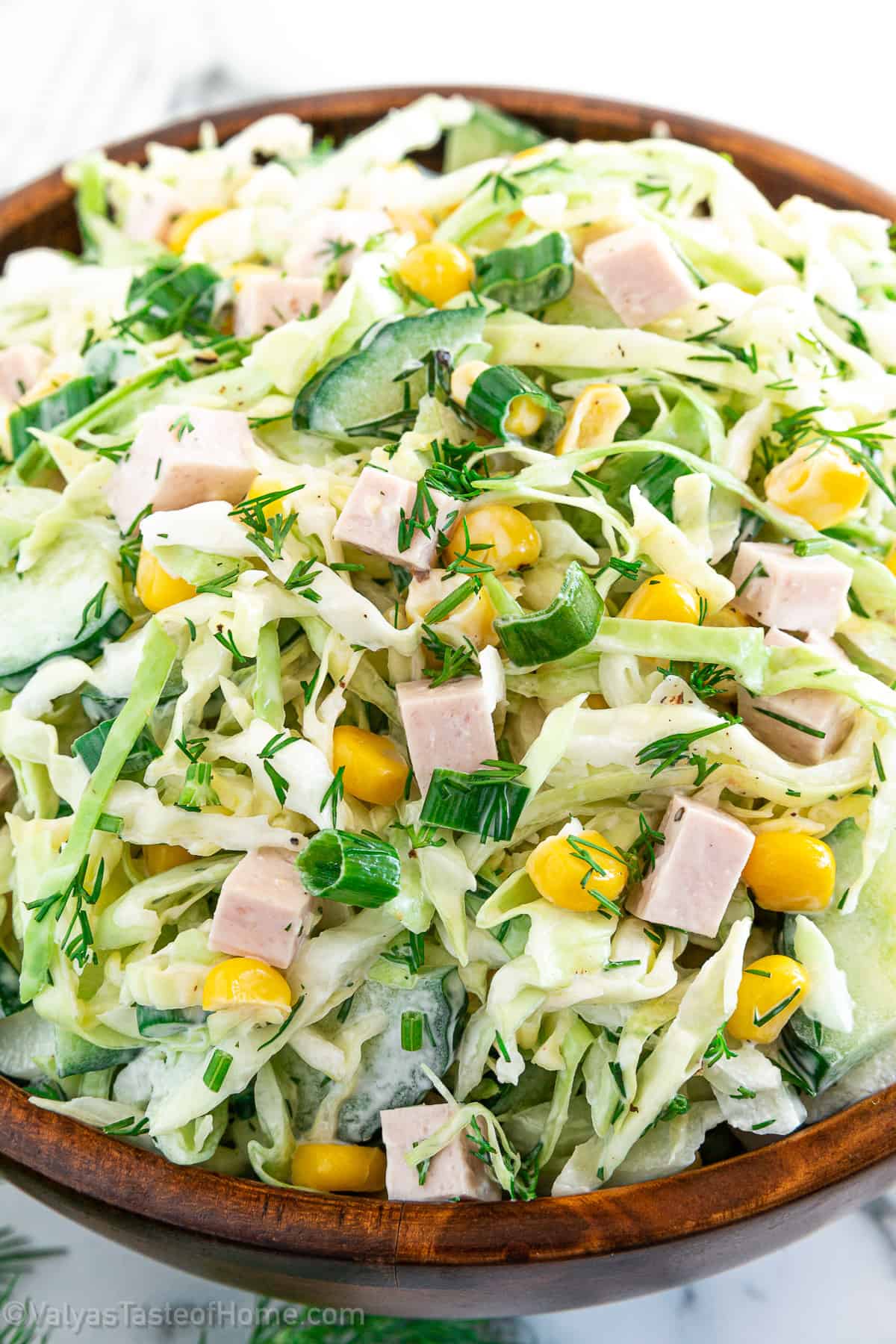 It features the perfect combination of veggies, mixed with mayo for a tasty side salad that is super simple to make! So simple that you don't even need a salad spinner for it.