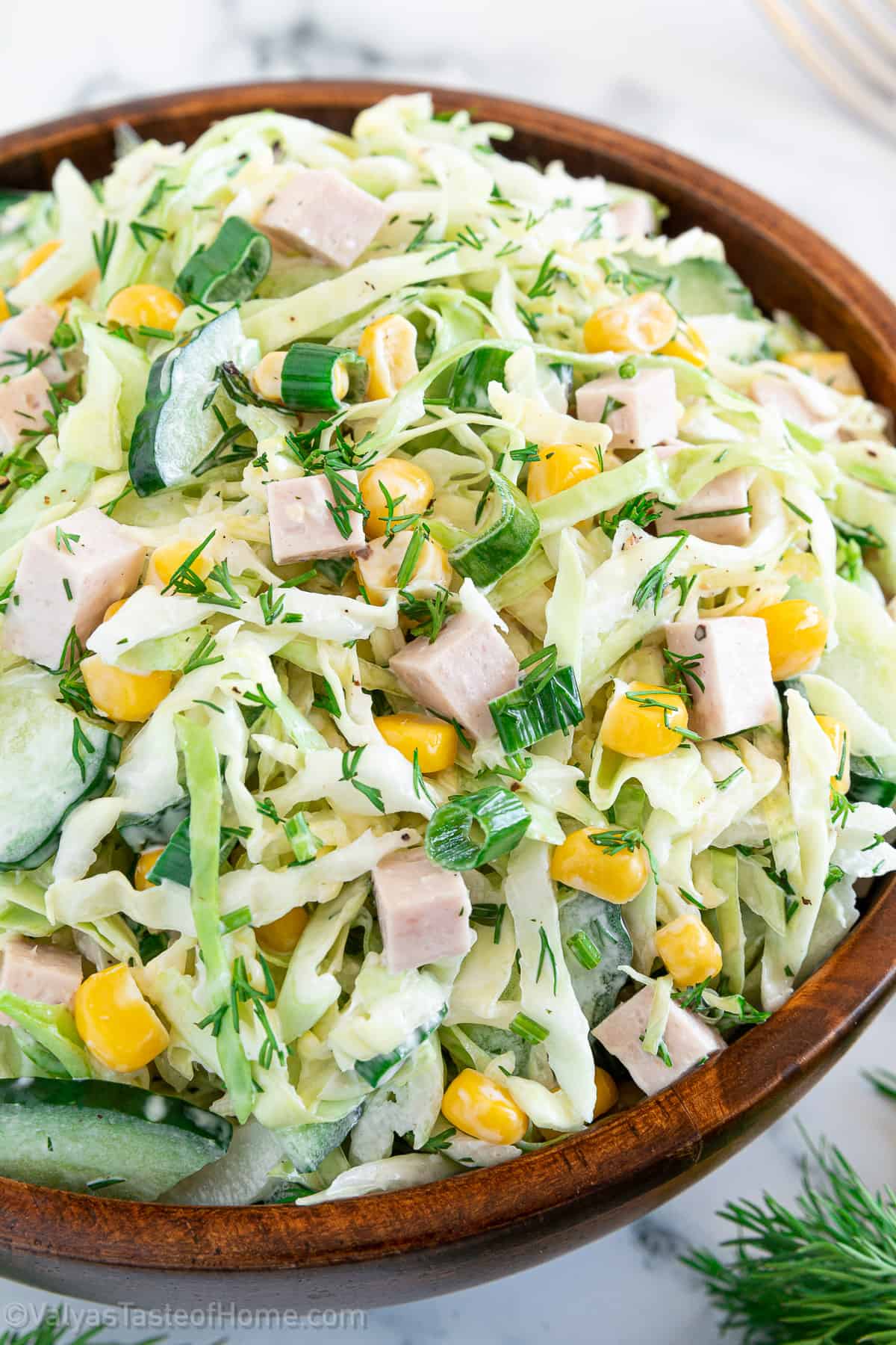 Salads made with cabbage tend to be my favorite. Crunchy cabbage, cucumbers, chives, and all the rest of the ingredients mixed with this brand of mayo, turn out into a perfectly tasty salad.