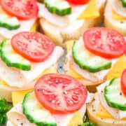 These turkey bites showcase classic flavor combinations that are sure to please everyone. The smoked turkey, fresh cucumbers, and tangy tomatoes are always a hit.