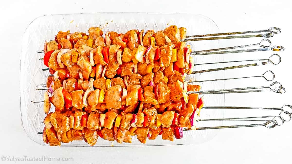 Thread the chicken and vegetables onto metal skewers, leaving a small space in between each of them.