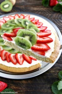 Another kid-friendly project is up again! Of course, there are lots of different fruit you can put on dessert pizza, but strawberry and kiwi is our family's absolute favorite combination, and this Strawberry Kiwi Dessert Pizza is my kid’s favorite dessert pizza.