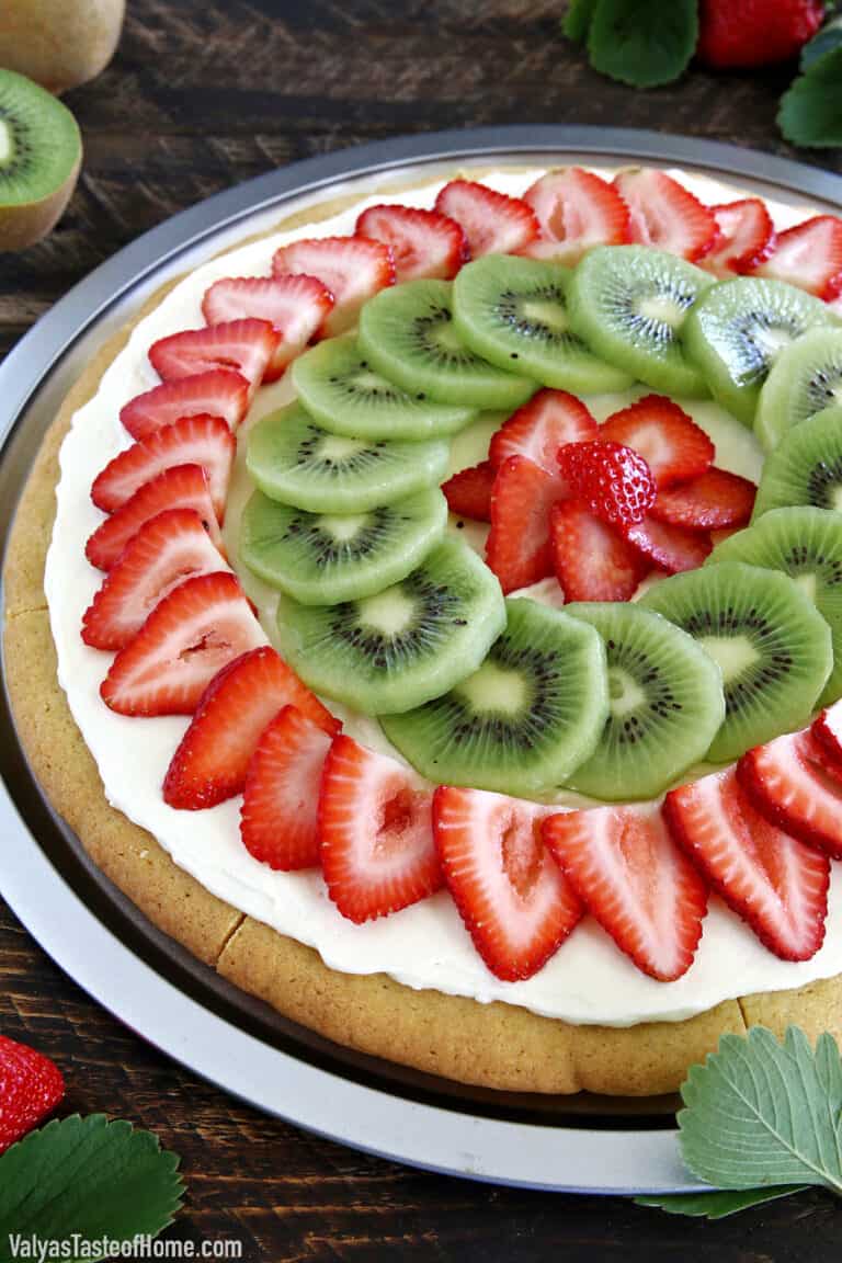 Another kid-friendly project is up again! Of course, there are lots of different fruit you can put on dessert pizza, but strawberry and kiwi is our family's absolute favorite combination, and this Strawberry Kiwi Dessert Pizza is my kid’s favorite dessert pizza.