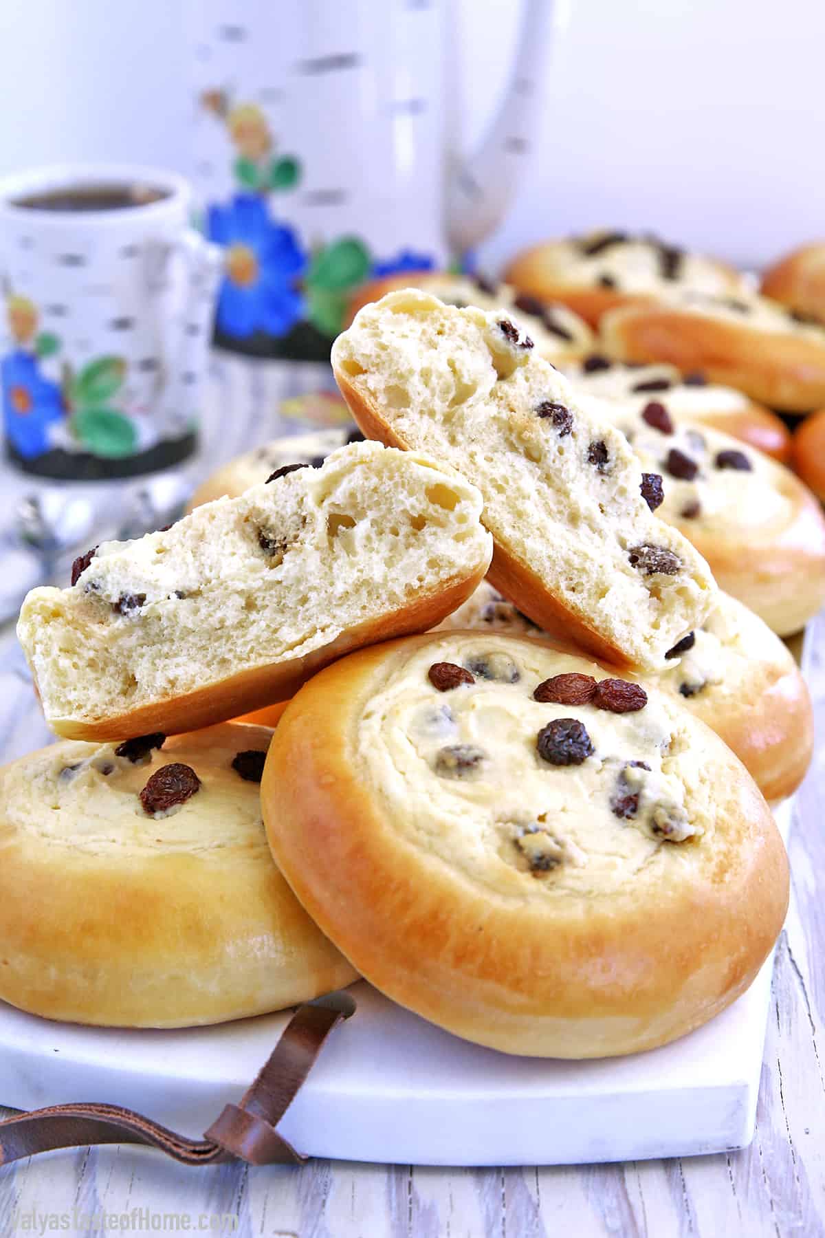 These Sweet Buns with Farmers Cheese and Raisins are made with a slightly sweet yeast dough that is topped with sweet farmer's cheese filling and is very popular in Eastern Europe.