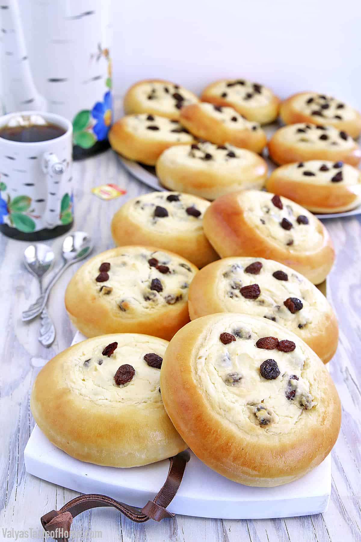 These Sweet Buns with Farmers Cheese and Raisins are made with a slightly sweet yeast dough that is topped with sweet farmer's cheese filling and is very popular in Eastern Europe.