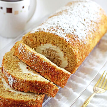 This Pumpkin Cake Roll is the perfect recipe for beginners to try, featuring a tasty pumpkin sponge cake rolled to perfection with a cream cheese filling!