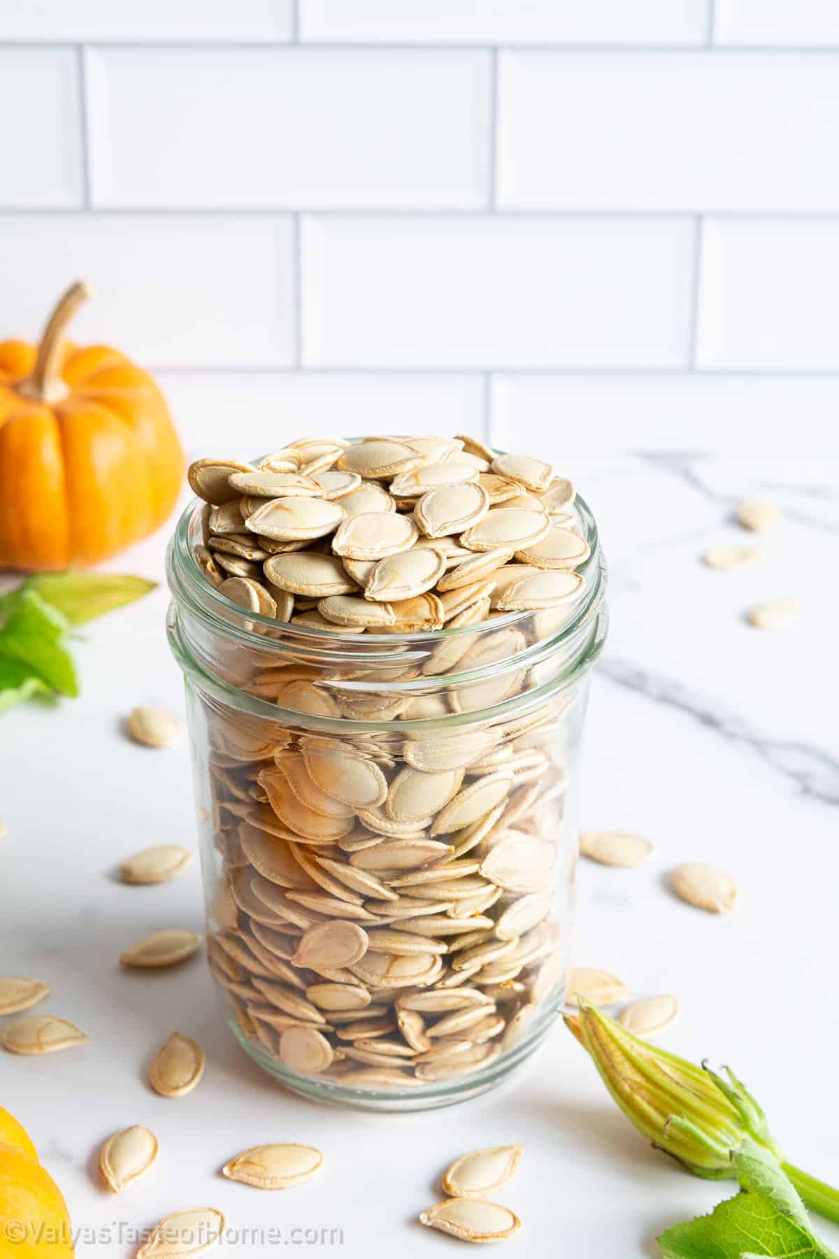 If you're carving pumpkins this fall, don't waste those seeds! Instead, try this super easy recipe for perfectly roasted pumpkin seeds for a healthy snack!