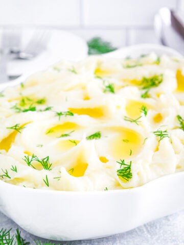 There's something heartwarming about a bowl of Mashed Potato Puree. The creamy texture, the rich flavor of the russets, the salty tang of the butter, and the smoothness of the cream cheese and heavy cream all come together to create a side dish that's nothing short of heavenly.