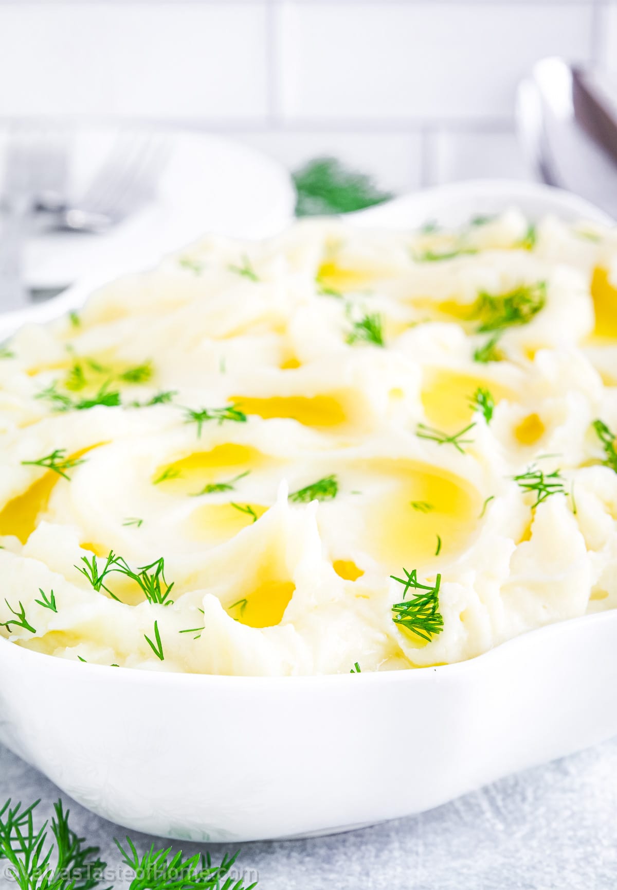 There's something heartwarming about a bowl of Mashed Potato Puree. The creamy texture, the rich flavor of the russets, the salty tang of the butter, and the smoothness of the cream cheese and heavy cream all come together to create a side dish that's nothing short of heavenly.