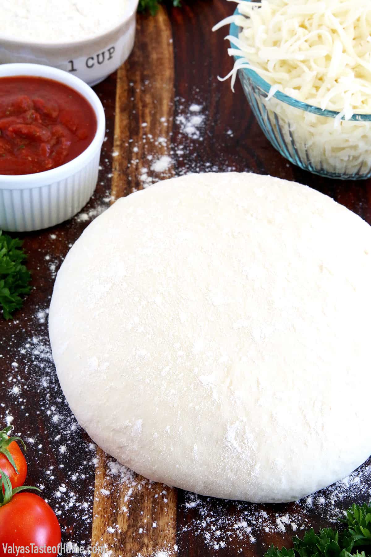 This homemade pizza dough recipe is perfect for beginners. You'll get a soft, fluffy, and chewy dough crust with it every time!
