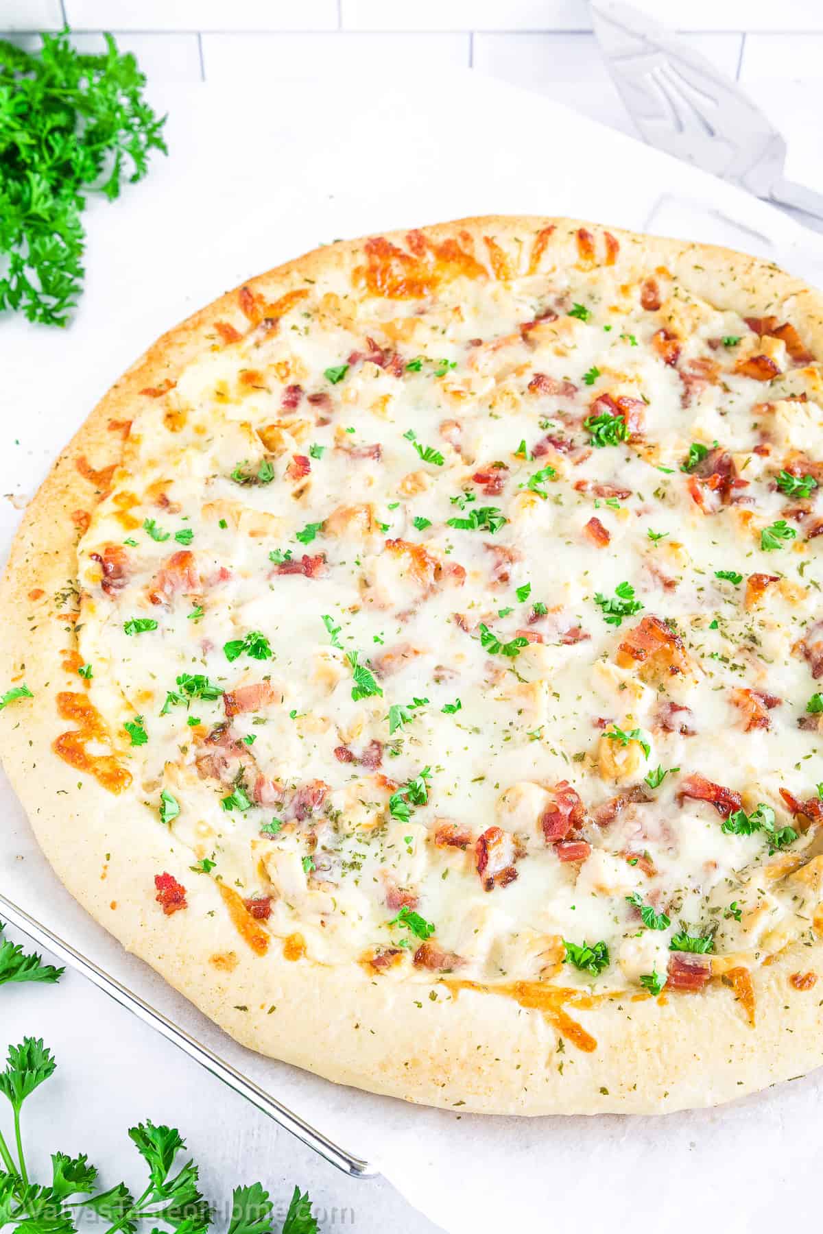 The combination of savory bacon, grilled chicken, and the rich Alfredo sauce is simply irresistible.