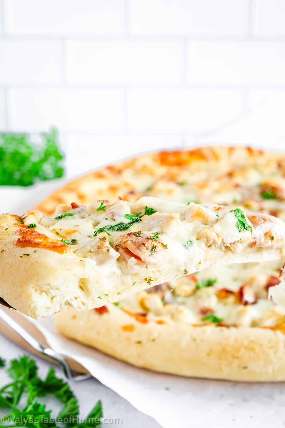 This recipe makes two large pizzas, making it perfect for parties and gatherings.