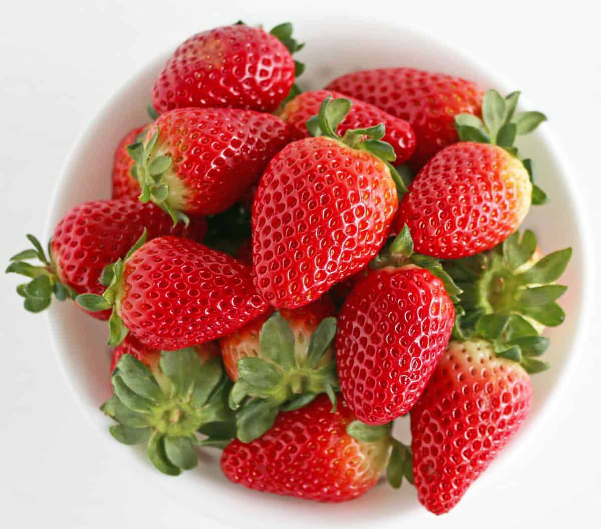 I love to add fresh-cut strawberries to my farmer's cheese cheesecakes.