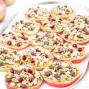This apple snack recipe is the most delicious combination of apple, peanut butter, and granola in a bite-size snack.