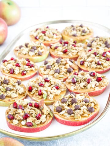 This apple snack recipe is the most delicious combination of apple, peanut butter, and granola in a bite-size snack.