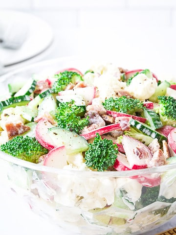 This easy Broccoli Bacon Salad is a refreshing twist on traditional salads, combining fresh broccoli florets, crisp bacon, and a variety of vegetables for a burst of flavor in every bite.
