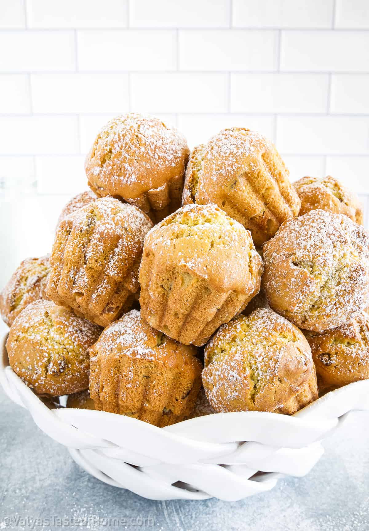 The finishing touch of powdered sugar on top adds a delightful sweetness that makes these muffins a must-have.