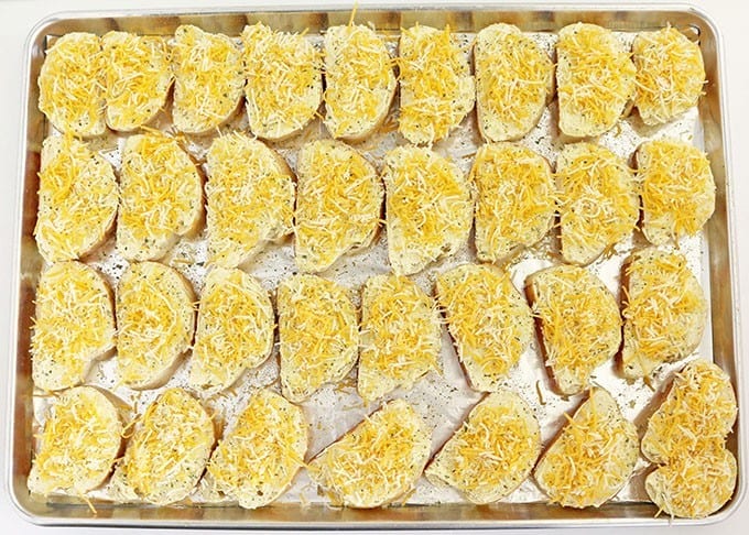 top each slice of bread with shredded cheese blend