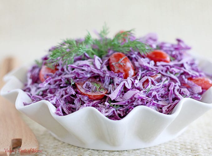 This Purple Cabbage Tomato Salad, like most, has its own distinct taste and deliciousness which I really like. It's easy to make and requires very few ingredients. The plain Greek Yogurt and mayonnaise dressing combo give it a rich, smooth and healthy flavor and texture.