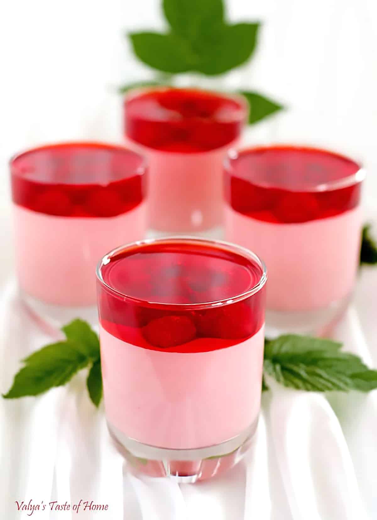 These delicious Greek Yogurt Raspberry Jell-O Mousse Dessert cups are very easy to put together but are a great mouth-pleaser. They can easily be made ahead of time and are very attractive on the dessert table.