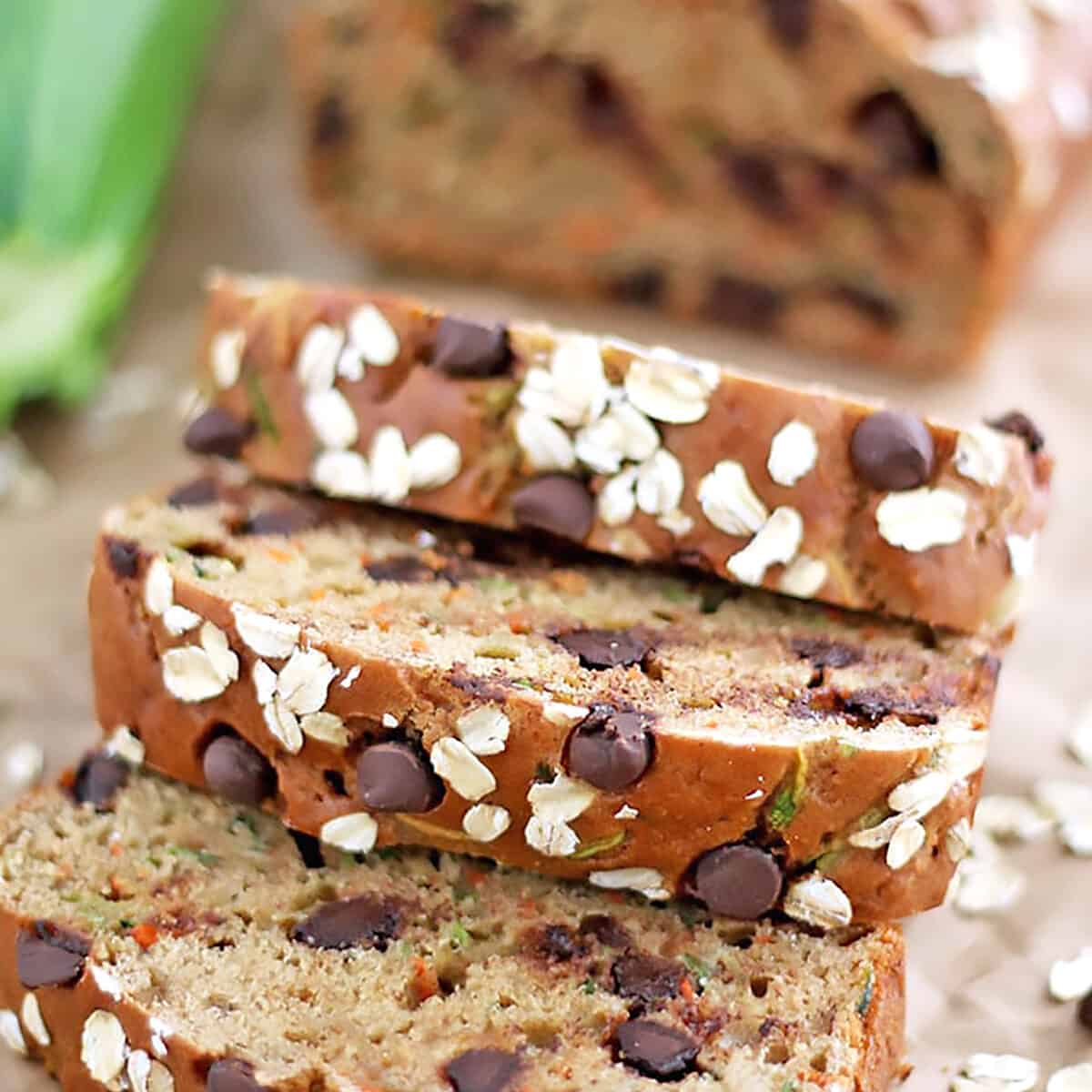 We are overloaded with carrots and zucchini in my garden this year. So, I thought I'd play with them and create some recipes. I literally tossed all ingredients together in just a few minutes is how this Greek Yogurt Carrot Zucchini Bread with Dark Chocolate Chip was created.