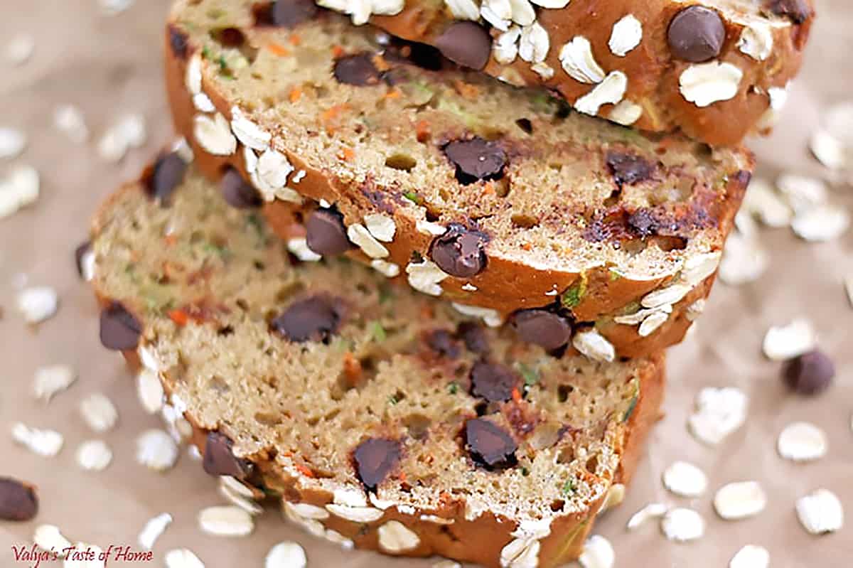 We are overloaded with carrots and zucchini in my garden this year. So, I thought I'd play with them and create some recipes. I literally tossed all ingredients together in just a few minutes is how this Greek Yogurt Carrot Zucchini Bread with Dark Chocolate Chip was created.