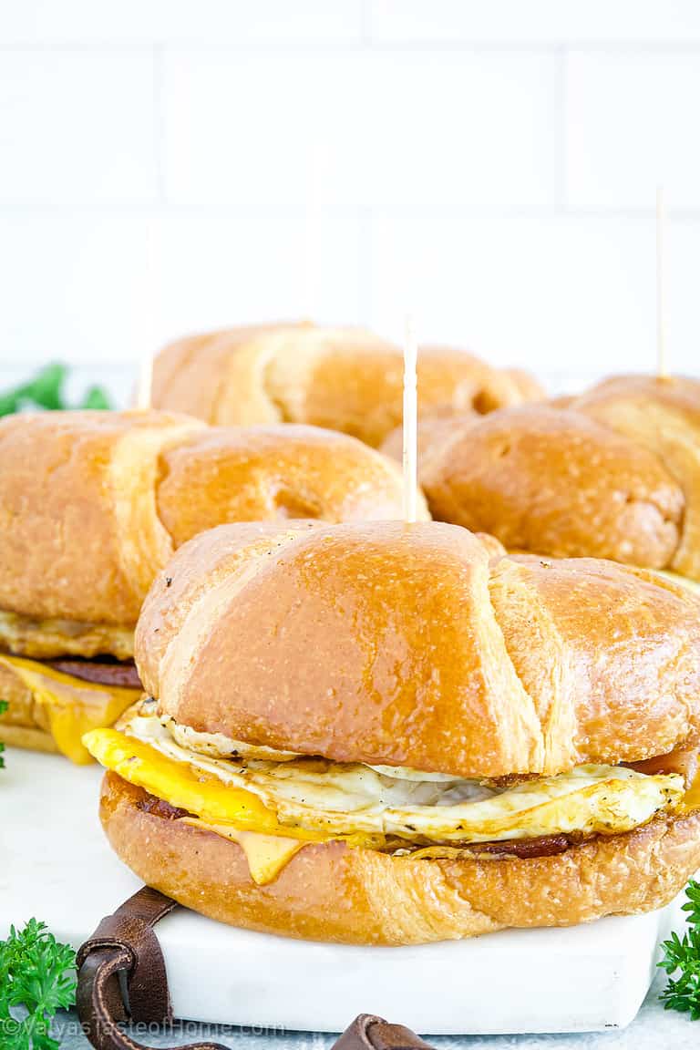 The key to a perfect croissanwich is to start with high-quality ingredients and to take time to cook each component to perfection.
