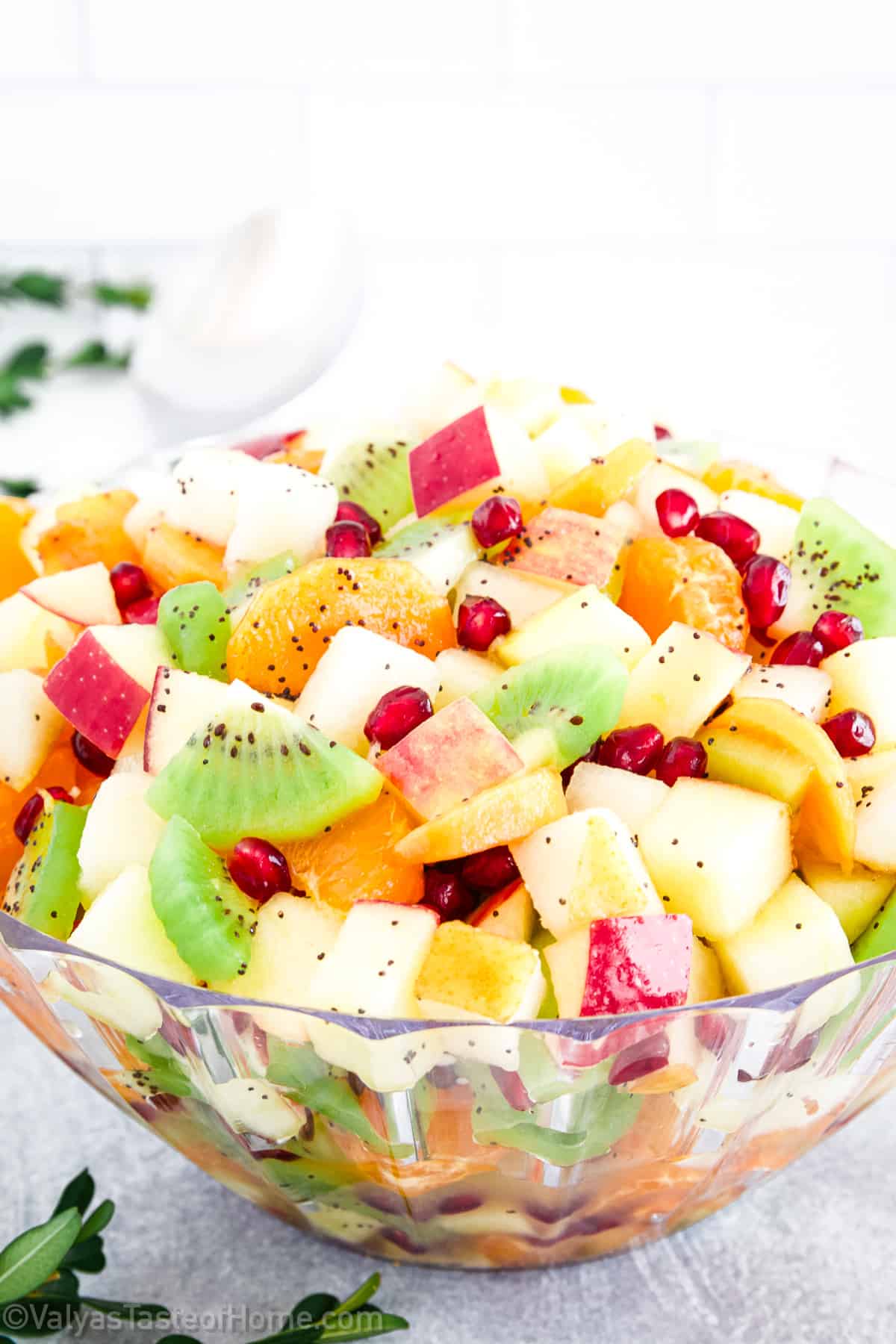 If you're a fruit lover, you're in for a treat with this winter fruit salad! It features a fantastic mix of fresh fruits, all dressed up in a tangy-sweet dressing made from orange, lemon, raw honey, and poppy seeds.