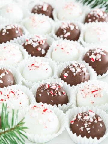 These Oreo Truffles (aka Oreo Balls!) are absolutely delicious and incredibly easy to make! They're made with cream cheese and crushed Oreos and then coated with melted chocolate for the perfect combination.