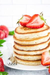 This Greek Yogurt Pancakes recipe is a game-changer! These pancakes are a little tangy, super fluffy, and a bit lighter than your usual recipe.
