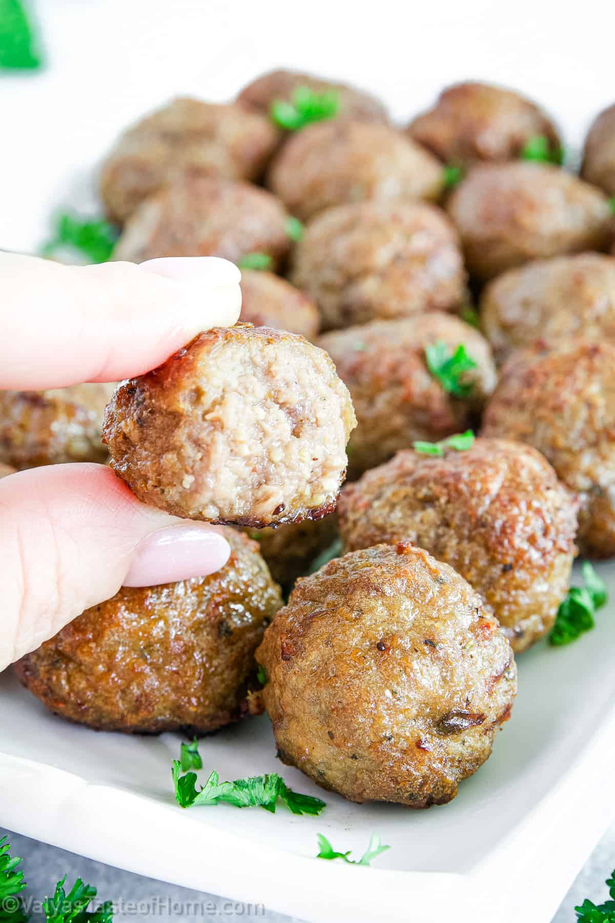 These baked meatballs feature the most classic flavor and are super easy to make at home. They're the tastiest ones you'll ever have and bake beautifully!