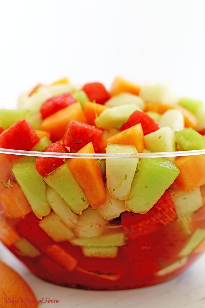 What can be better than a bowl of chilled Melon Fruit Salad with Honey Lime and Watermelon Juice Dressing on a hot summer day? While you shouldn’t abandon your water consumption, a nice bowl of this refreshing watery fruit with a touch of sweetness is sure to hit that thirsty and sweet spot. It’s a brilliant addition to any outdoor party.