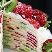This Crepe Cake is a delicious, beautiful dessert that combines the delicate elegance of crepes with a tasty cream filling and vibrant bursts of fresh fruits.