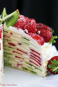 This Crepe Cake is a delicious, beautiful dessert that combines the delicate elegance of crepes with a tasty cream filling and vibrant bursts of fresh fruits.