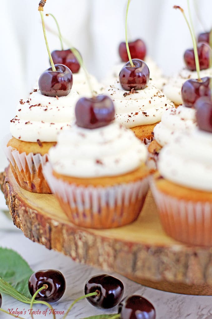 Fresh cherries are then added to the batter, either pitted and chopped or left whole, to infuse the cupcakes with their natural sweetness and tang.