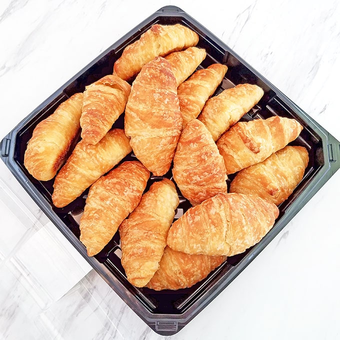 You can pick up a pack of these at your local bakery or grocery store. They have a delicious light buttery flavor that goes great with the eggs and bacon. 