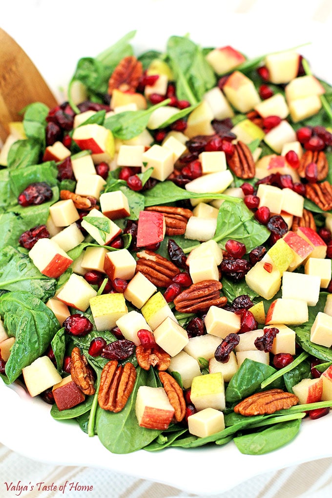 What is there not to love about fresh and beautiful salad? This Pear Apple Pomegranate Pecan Spinach Salad Recipe is so easy to make and is such an attractive addition to your table. #pearapplepomegranatepecanspinachsalad #spinachsaladrecipe #holidaysalad #thanksgivingsalad #christmassalad #valyastasteofhome