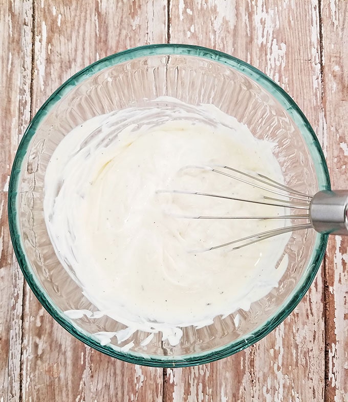 Combine and whisk together ranch and Greek yogurt with a small hand whisker.