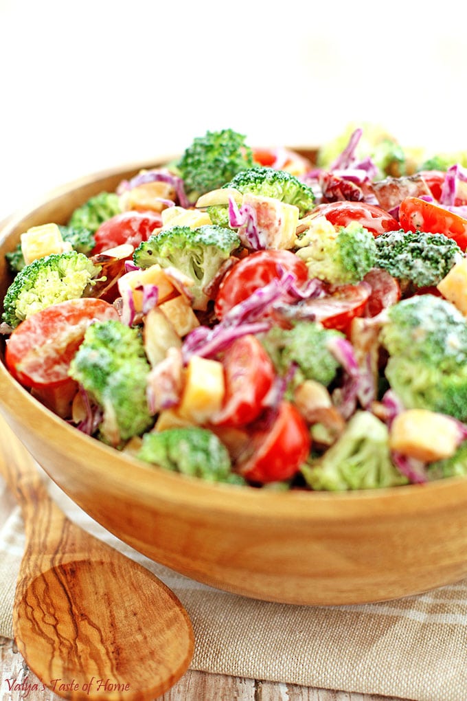 This Creamy Cheddar Broccoli and Tomato Salad Recipe is a great addition to your holiday feast or any occasion at any time of the year. Surprise and delight your family or guests with this different but totally delicious and beautiful looking salad on your table. Its taste is so flavorful, crisp, refreshing and satisfying, it is sure to impress! #creamybroccoliandtomatosalad #holidaysalad #creamycheddarbroccolitomatosalad #valyastasteofhome